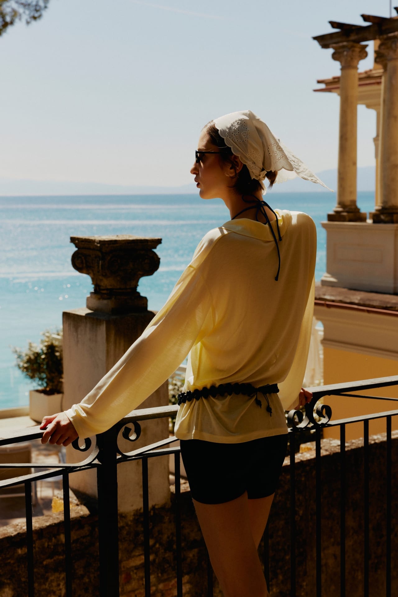 Guest being served on a seafront hotel terrace